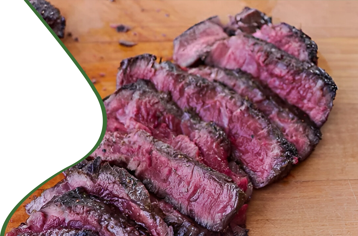 A close up of some meat on a cutting board